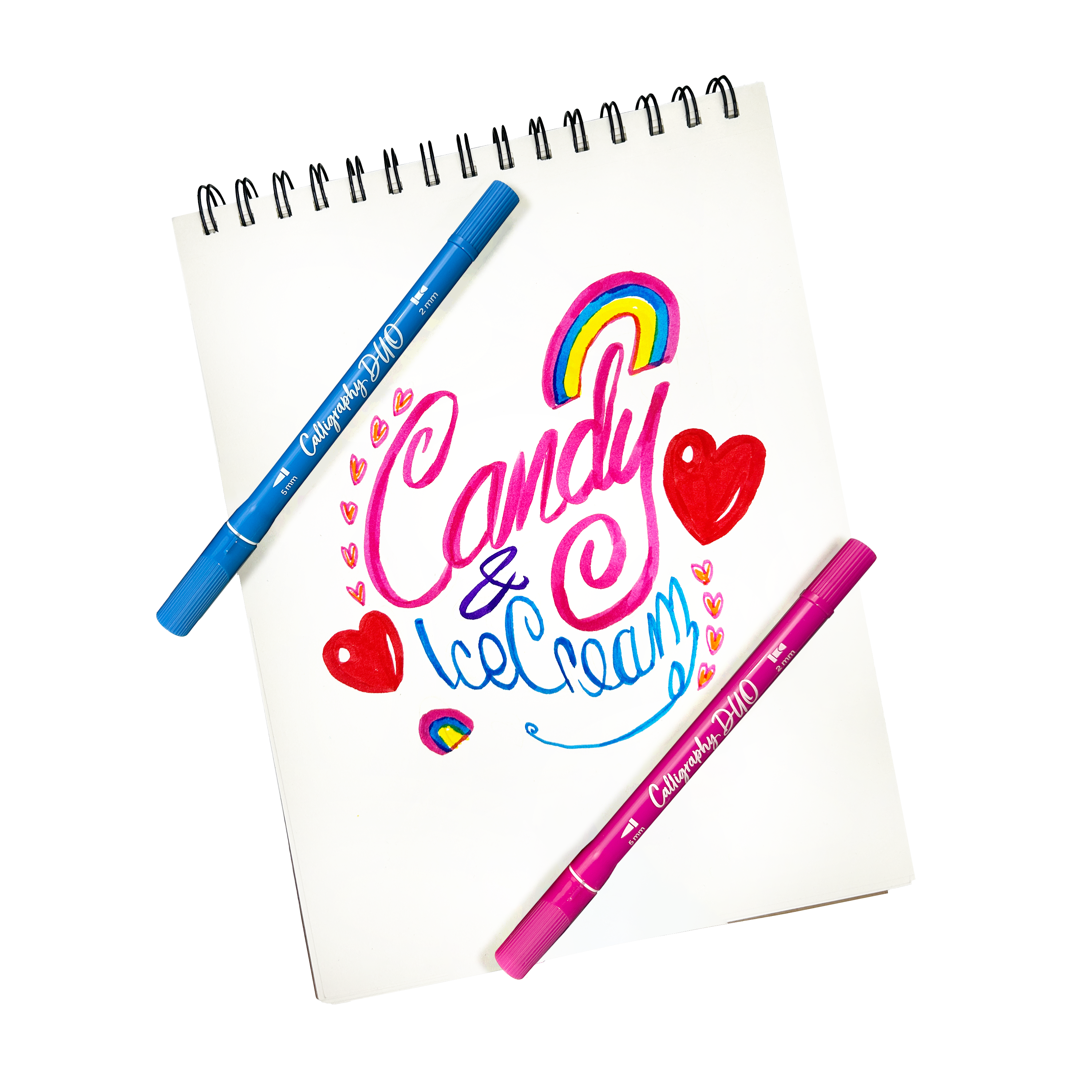 Stylized hand lettering that says "Candy & Ice Cream" on a white pad made with OOLY Calligraphy Duo Double-Ended Markers