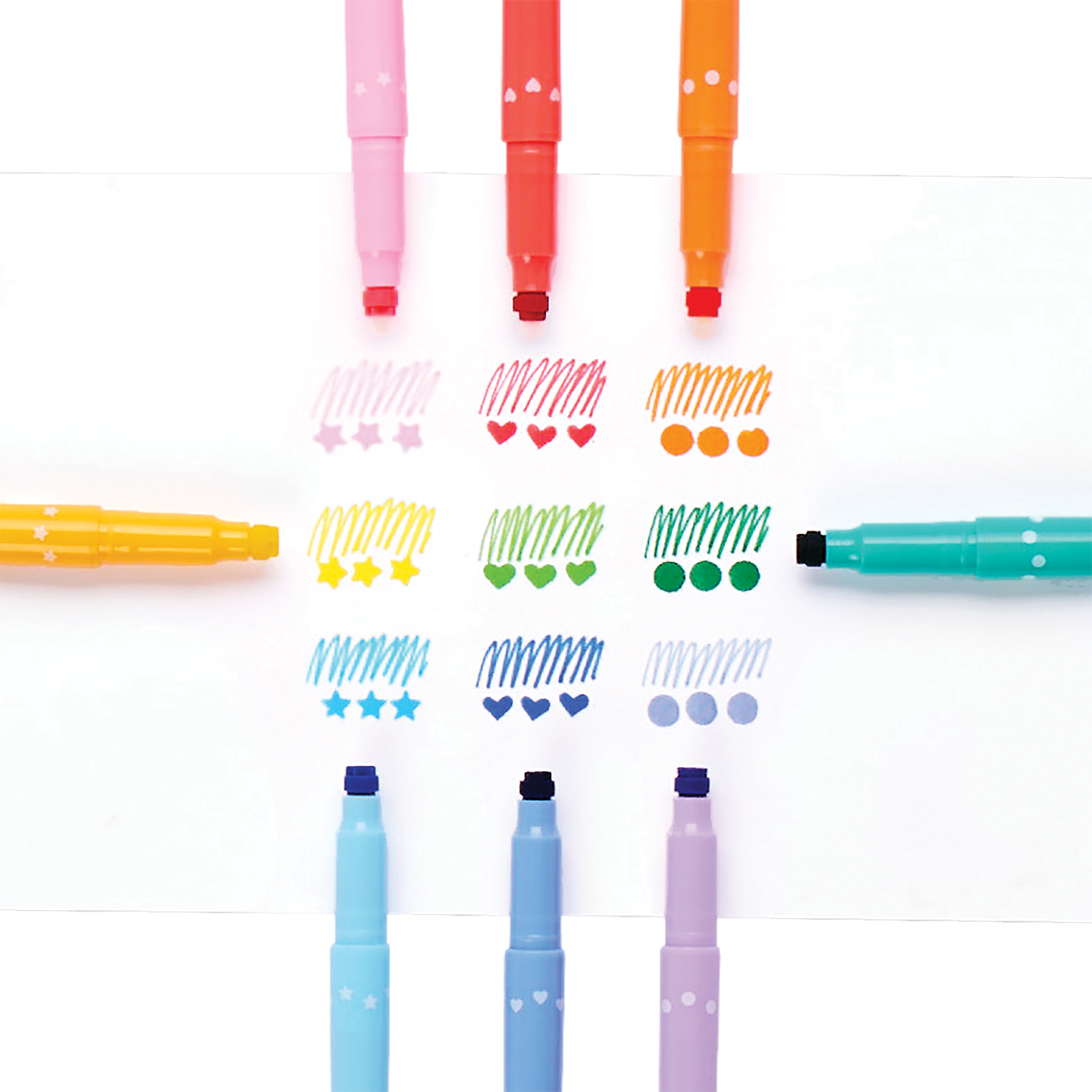 Colored swatches of scribbles and stamps from OOLY Confetti Stamp Double-Ended Markers