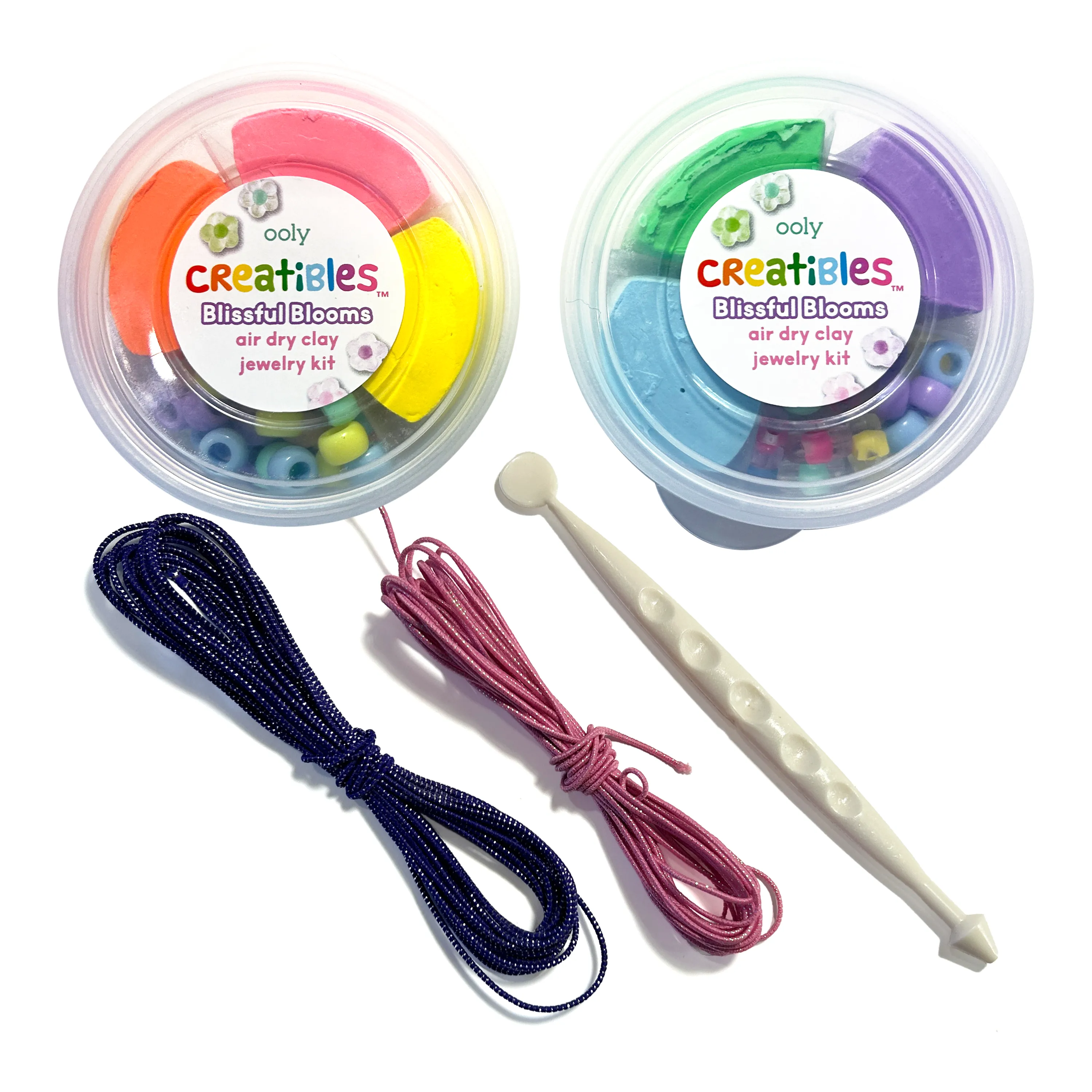 Two tubs of air dry clay and beads with cords and stylus from the OOLY Creatibles Air Dry Clay Jewelry Kit - Blissful Blooms