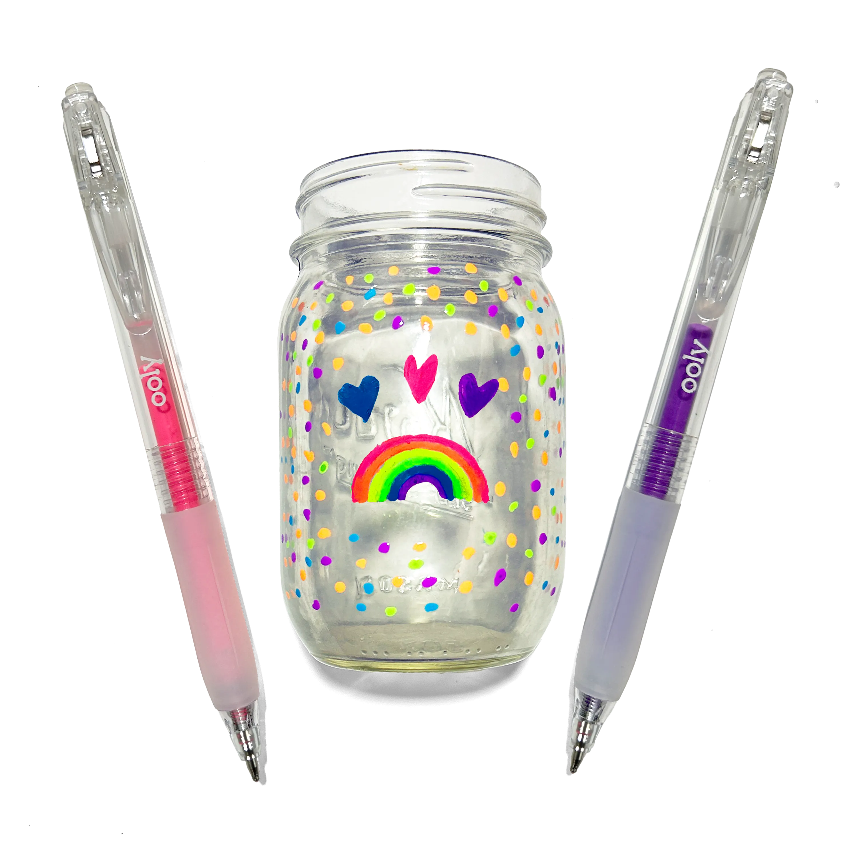 Colored pens and a jar colored with hearts and a rainbow made with OOLY Jelly Gloss Neon Multi-Surface Deco Gel Pens