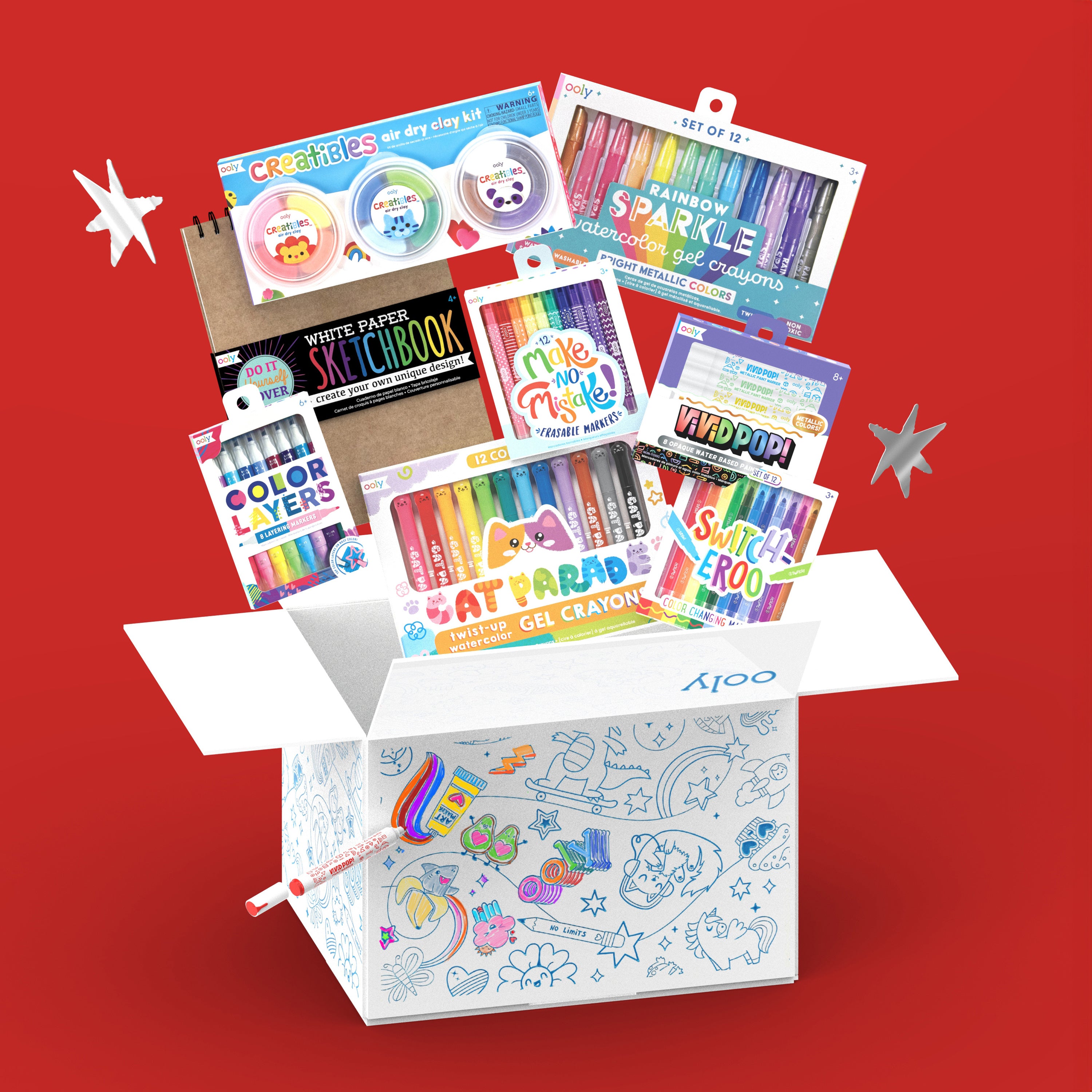 Collection of products coming out of coloring box from OOLY Magic Maker Bonus Box