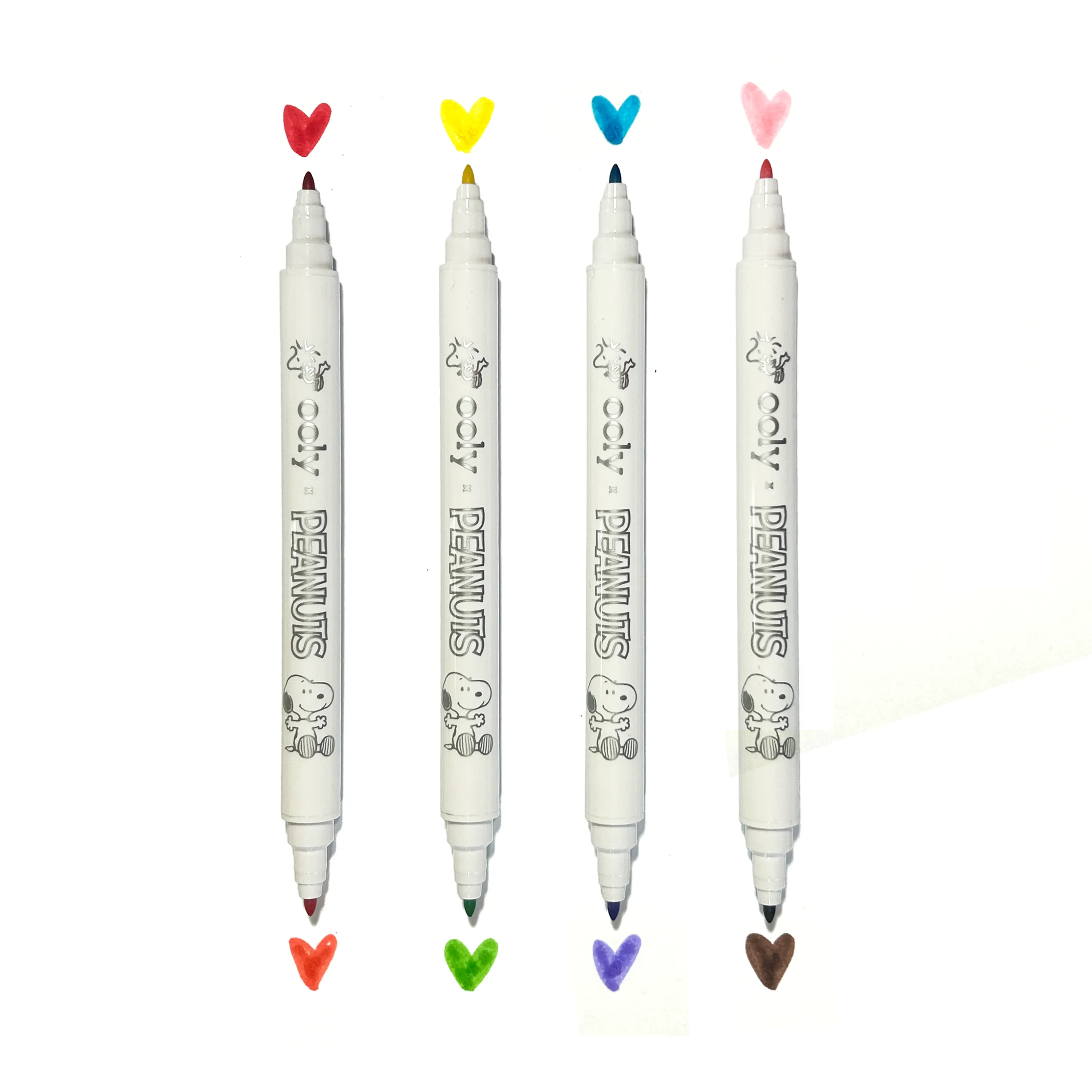 Row of 4 double ended markers with heart swatches from the OOLY x Peanuts Activity Travel Kit & Double-Ended Markers set