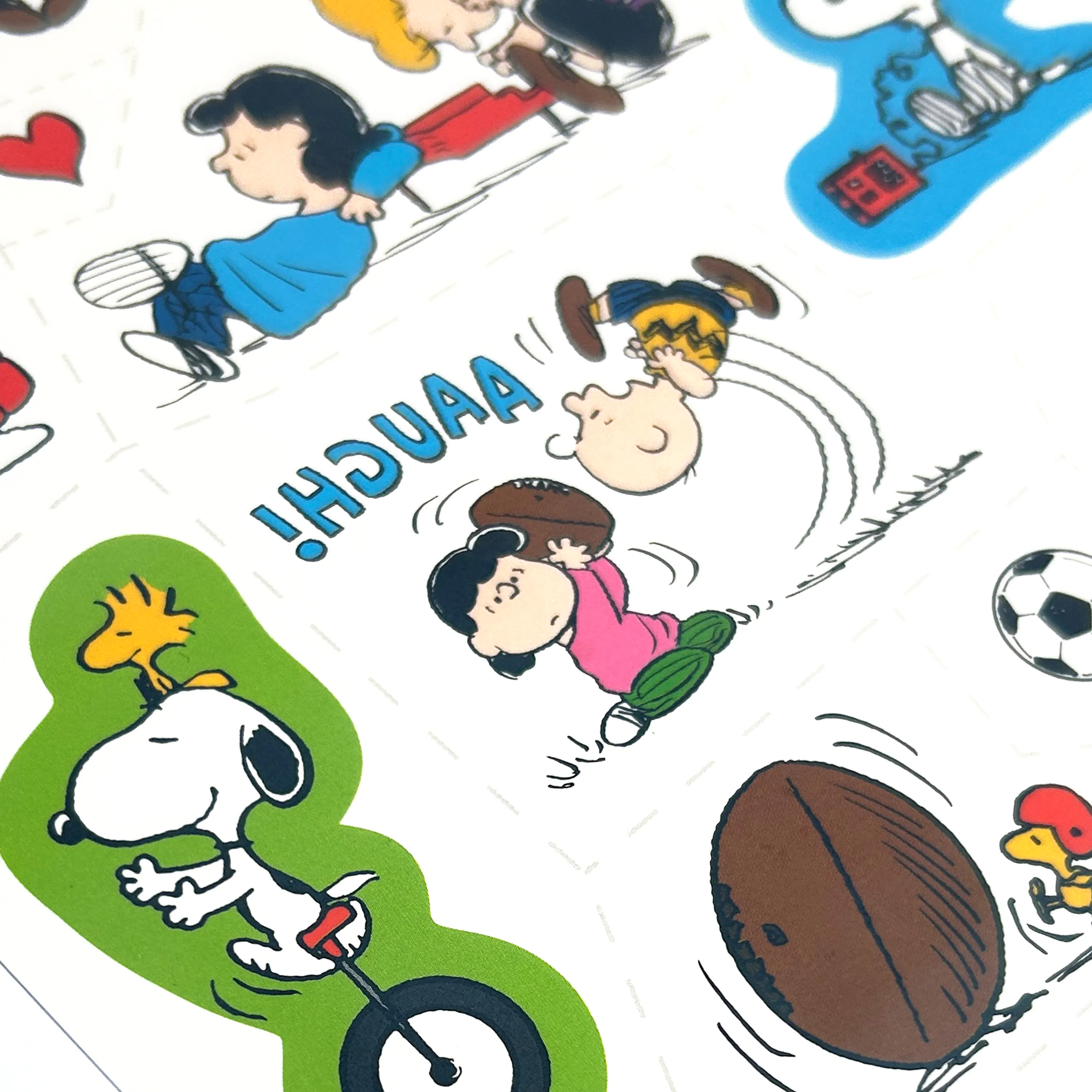 Close up of tattoo sheets with Charlie Brown from a set of OOLY x Peanuts Temporary Tattoos