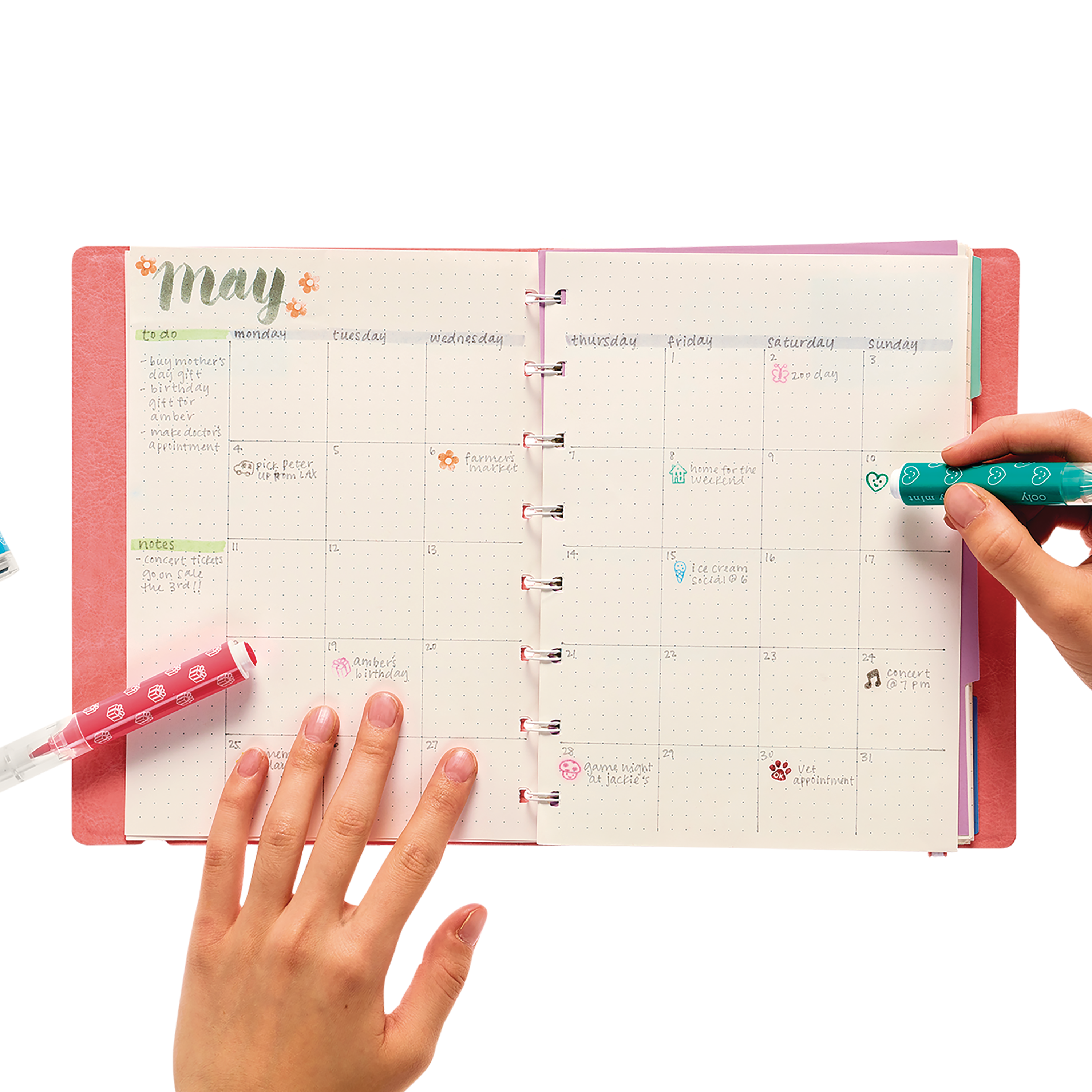 Placing colored stamps in a planner calendar with Stampables Double-Ended Stamp & Brush Markers