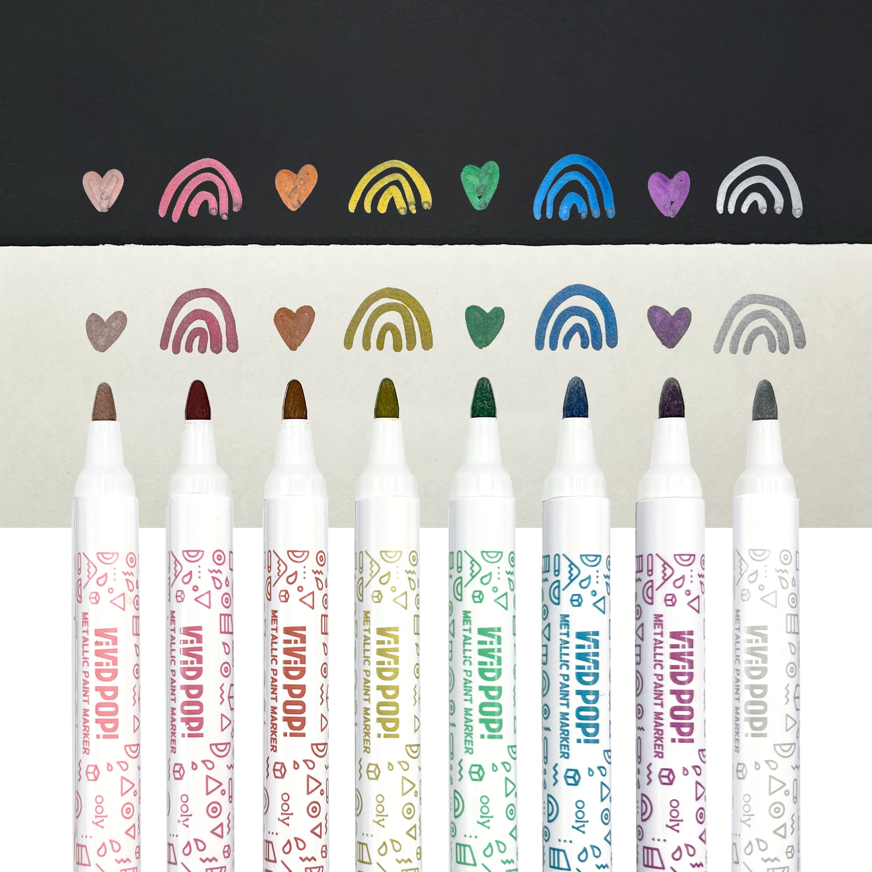 Row of OOLY Metallic Vivid Pop! Water Based Paint Markers with swatches on white and black paper